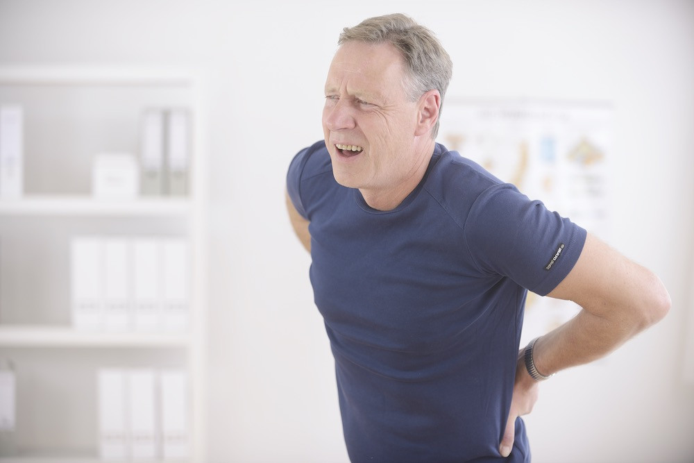 man with lower back pain